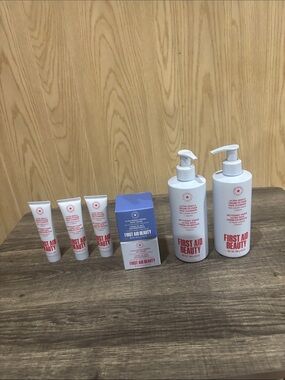 First Aid Beauty White Bottles and Blue Box Skincare Set